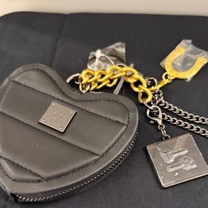 Think Royln purse charm/coin purse in black with both pewter or gold
